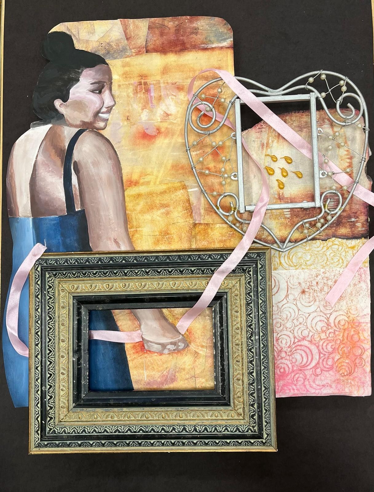 Mixed media piece: a painted cut-out of a dancer with a hair bun, combined with an ornate frame, wire basket, ribbon, and textured papers.